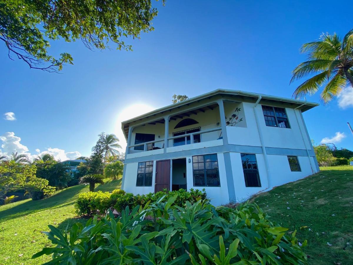 Sea Cliff Eco-Cottages & Gin Distillery Calibishie Eksteriør billede