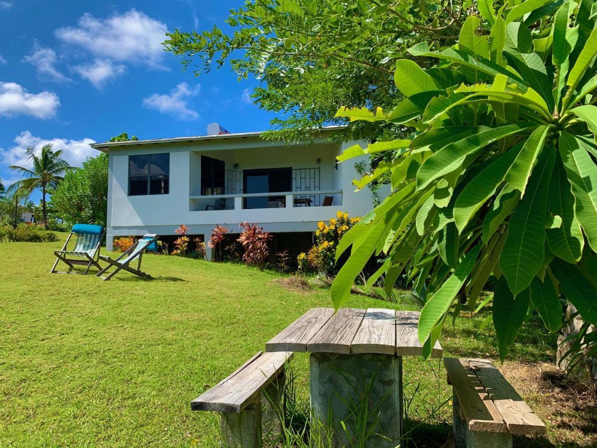 Sea Cliff Eco-Cottages & Gin Distillery Calibishie Eksteriør billede