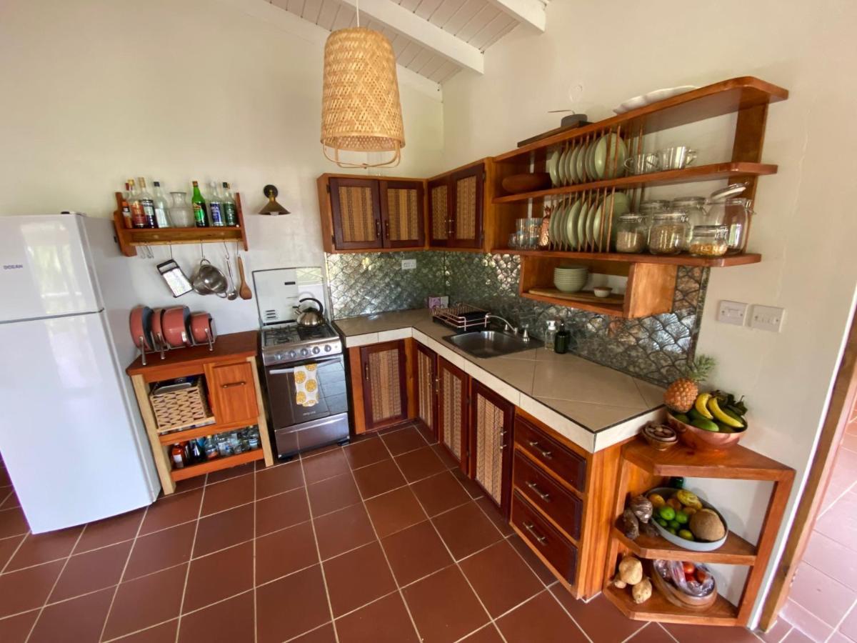 Sea Cliff Eco-Cottages & Gin Distillery Calibishie Eksteriør billede